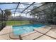 A stunning in-ground pool offers a refreshing escape with its sparkling waters at 1494 Grace Lake Cir, Longwood, FL 32750