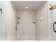 Well-lit shower area with handheld shower head, and built-in shelving at 1494 Grace Lake Cir, Longwood, FL 32750