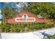North Cove neighborhood brick signage with manicured landscaping at 1494 Grace Lake Cir, Longwood, FL 32750