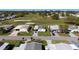 Aerial view of the home in a well-maintained community with a golf course nearby at 1510 E Schwartz Blvd, The Villages, FL 32159