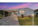 Charming single-story home with an open carport and well-maintained front yard landscaping at 1510 E Schwartz Blvd, The Villages, FL 32159