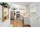 Well-equipped kitchen with stainless steel appliances, natural light, and efficient design at 1510 E Schwartz Blvd, The Villages, FL 32159