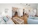 Inviting living room featuring hardwood floors and stylish furnishings at 1510 E Schwartz Blvd, The Villages, FL 32159