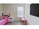bedroom features a large window, a study desk, and a twin bed at 15475 Camp Dubois Cres, Winter Garden, FL 34787