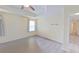 Spacious bedroom featuring wood-look floors, a window, and an ensuite bathroom at 15475 Camp Dubois Cres, Winter Garden, FL 34787