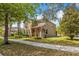 Charming two-story home with manicured lawn and mature landscaping at 15475 Camp Dubois Cres, Winter Garden, FL 34787