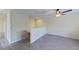 Neutral living room features wood floors and access to other parts of the home at 15475 Camp Dubois Cres, Winter Garden, FL 34787