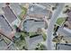 Aerial view highlighting the home's property lines, well-maintained landscaping, and proximity to surrounding neighborhood at 17714 Se 84Th Sheldon Ter, The Villages, FL 32162