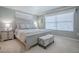 Comfortable bedroom featuring soft lighting and neutral decor at 17714 Se 84Th Sheldon Ter, The Villages, FL 32162