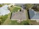 A single-story home offers a large backyard with mature trees, a spacious yard, and is close to neighbors at 1792 Presidio Dr, Clermont, FL 34711