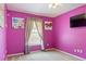 Bedroom featuring a ceiling fan, carpeted floors, and natural light from the window at 1792 Presidio Dr, Clermont, FL 34711