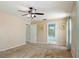 Bedroom featuring carpet, ceiling fan, and doorways to other rooms at 1792 Presidio Dr, Clermont, FL 34711