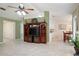 Open-concept living room connected to the kitchen and dining area, perfect for entertaining guests at 1792 Presidio Dr, Clermont, FL 34711