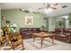 Spacious living room with comfortable seating, offering a cozy atmosphere for relaxation and gatherings at 1792 Presidio Dr, Clermont, FL 34711