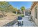 A large backyard with lush green grass, a palm tree and room for entertaining at 181 Sutter Dr, Clermont, FL 34711
