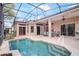 Relaxing screened-in pool and patio area for outdoor living and entertaining at 20755 Queen Alexandra Dr, Leesburg, FL 34748