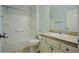 Bathroom with vanity, toilet, and shower-tub combination at 2082 Harston Trl, The Villages, FL 32162