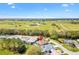 Scenic aerial shot highlighting the home's proximity to a horse farm and other beautiful residences at 2126 Sansores St, The Villages, FL 32159