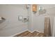 Walk-in closet with ample shelving and wood look flooring at 213 Primrose Dr, Davenport, FL 33837