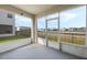 Screened patio offers outdoor living with views of the fenced backyard at 213 Primrose Dr, Davenport, FL 33837