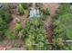 An aerial view of a home with a large, wooded lot at 21311 Sw Marine Blvd, Dunnellon, FL 34431