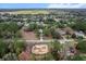 An aerial view showing the property and its proximity to other neighborhood homes at 21311 Sw Marine Blvd, Dunnellon, FL 34431