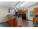Kitchen with stainless steel appliances, mosaic backsplash, and wooden cabinets at 21311 Sw Marine Blvd, Dunnellon, FL 34431