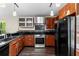 A clean kitchen with a stainless steel range hood and updated appliances at 21311 Sw Marine Blvd, Dunnellon, FL 34431