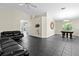 Large living room featuring tile floors and a traditional sofa at 21311 Sw Marine Blvd, Dunnellon, FL 34431