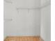 Walk-in closet with shelving in an empty room with carpet at 21311 Sw Marine Blvd, Dunnellon, FL 34431
