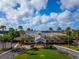 Exterior aerial view of a beautiful community center with green space and landscaping at 2174 Wallingford Loop, Mount Dora, FL 32757