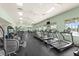 Gym with exercise machines including treadmills and weight machines for a comprehensive workout at 2174 Wallingford Loop, Mount Dora, FL 32757