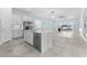 Bright kitchen features a large island, stainless steel appliances, and an open concept layout perfect for entertaining at 2174 Wallingford Loop, Mount Dora, FL 32757