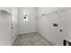 Laundry room featuring tile flooring, utility sink and closet at 2174 Wallingford Loop, Mount Dora, FL 32757