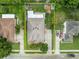 Aerial view showcasing the property's layout, fenced backyard, and surrounding neighborhood at 257 Winding Cove Ave, Apopka, FL 32703