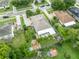 Aerial view showcasing the backyard with a deck and screened-in porch at 257 Winding Cove Ave, Apopka, FL 32703