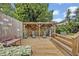 Relaxing backyard deck with shaded lounge area, perfect for enjoying the outdoors in comfort at 257 Winding Cove Ave, Apopka, FL 32703