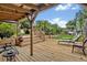 Expansive backyard deck ideal for outdoor entertaining, featuring multiple seating areas and lush landscaping at 257 Winding Cove Ave, Apopka, FL 32703