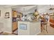 Kitchen with granite countertops, stainless steel appliances and an open view to the living spaces at 257 Winding Cove Ave, Apopka, FL 32703