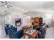 Vaulted ceiling with an open concept living area, laminate flooring, neutral paint, and contemporary decor at 26800 Racquet Cir, Leesburg, FL 34748
