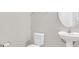 Half-bathroom with white fixtures at 3054 Hill Point St, Minneola, FL 34715
