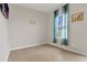 Bright bedroom with tile flooring, sheer curtains, and neutral wall paint at 3054 Hill Point St, Minneola, FL 34715