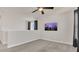 Upstairs bonus room with television, fan and large windows at 3054 Hill Point St, Minneola, FL 34715