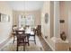 Dining room bathed in natural light at 306 Orista Dr, Davenport, FL 33897