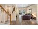 Open-concept living room flowing out to the pool area at 306 Orista Dr, Davenport, FL 33897