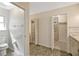 Bright bathroom featuring accessible design elements and closet at 341 Ranchwood Dr, Leesburg, FL 34748
