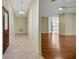 Home features tile foyer leading to living areas with hardwood floors at 341 Ranchwood Dr, Leesburg, FL 34748