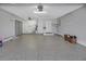 Large garage has sealed floors and separate utility room at 341 Ranchwood Dr, Leesburg, FL 34748