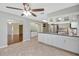 Well-appointed kitchen with stainless steel appliances and convenient access to other living areas at 341 Ranchwood Dr, Leesburg, FL 34748