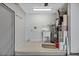 The laundry room features a utility sink and water heater at 341 Ranchwood Dr, Leesburg, FL 34748